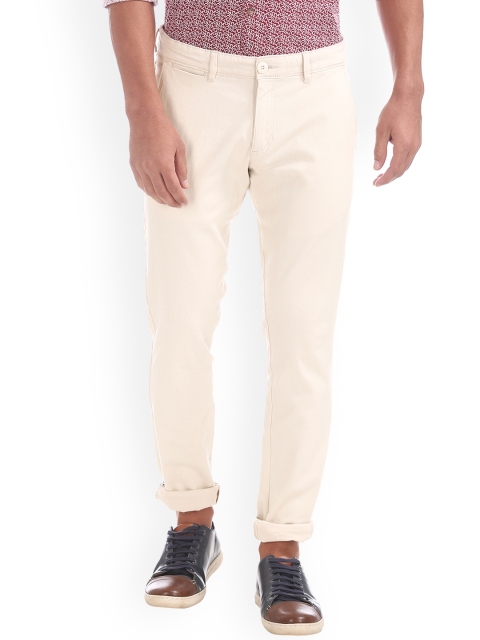 

Ruggers Men Beige Tapered Fit Solid Regular Trousers