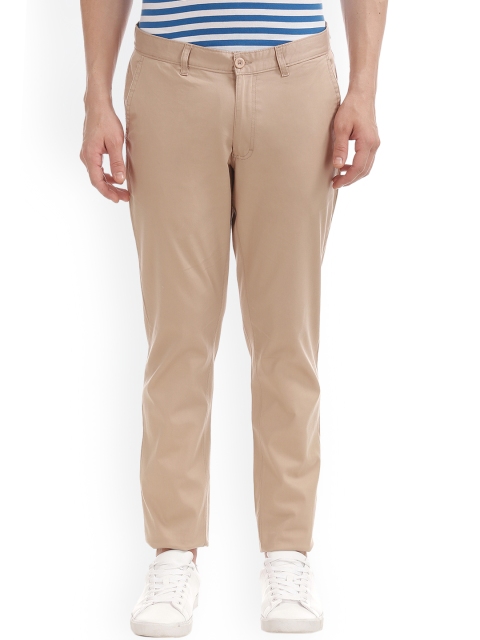 

Ruggers Men Beige Regular Fit Solid Regular Trousers