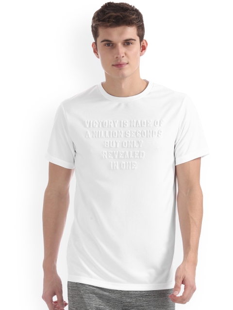 

Colt Men White Self Design Round Neck T-shirt
