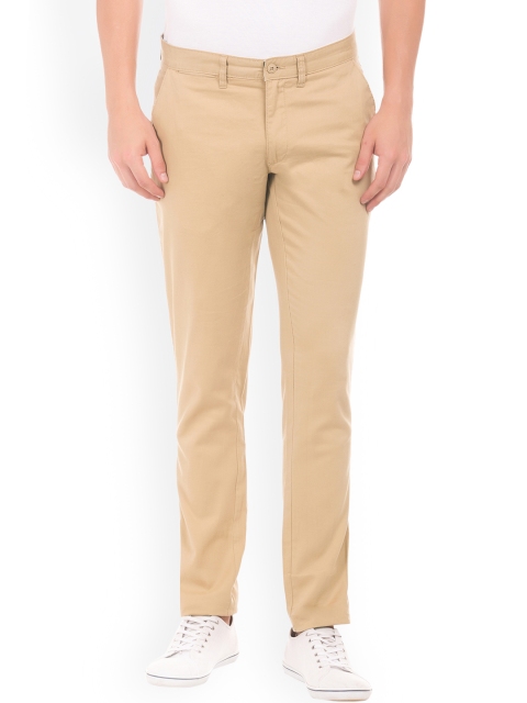 

Ruggers Men Beige Tapered Fit Solid Regular Trousers