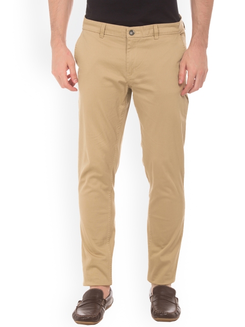 

Ruggers Men Beige Regular Fit Solid Regular Trousers