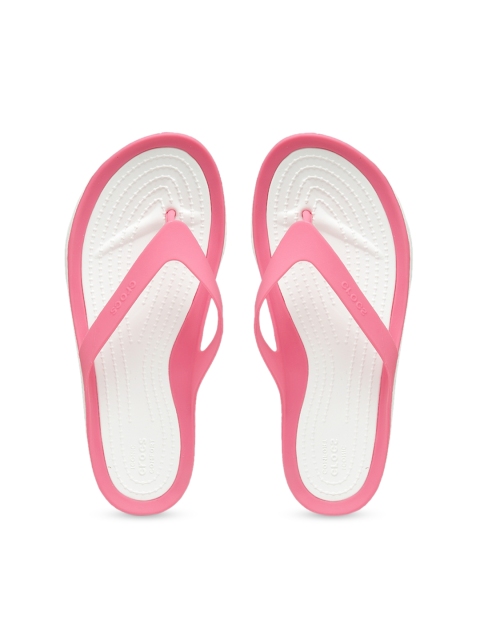 

Crocs Women Pink Solid Flip Flops
