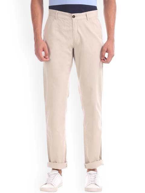 

Arrow Sport Men Beige Slim Fit Solid Regular Trousers