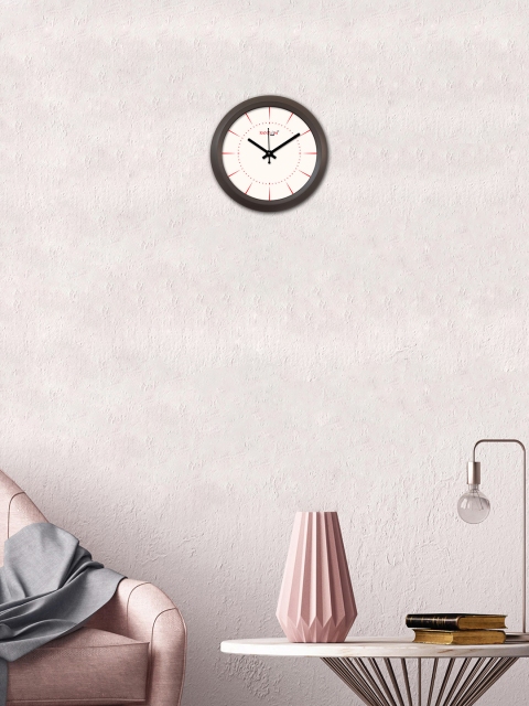 

RANDOM White Round Solid 29.21 cm Analogue Wall Clock
