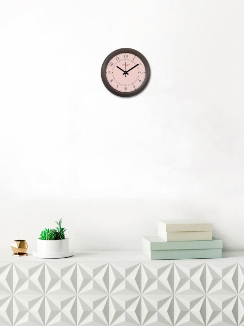 

RANDOM Pink Round Solid 29.21 cm Analogue Wall Clock