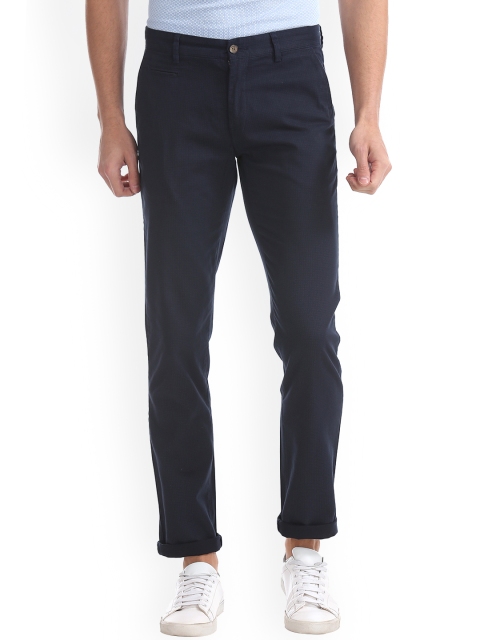 

Arrow Sport Men Blue Slim Fit Self Design Regular Trousers