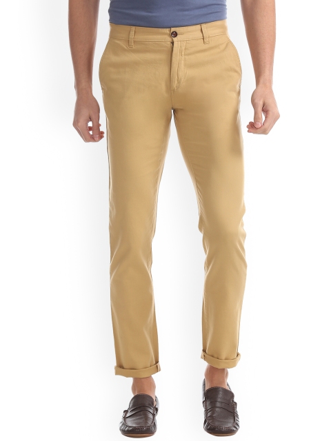 

Arrow Sport Men Beige Slim Fit Solid Regular Trousers