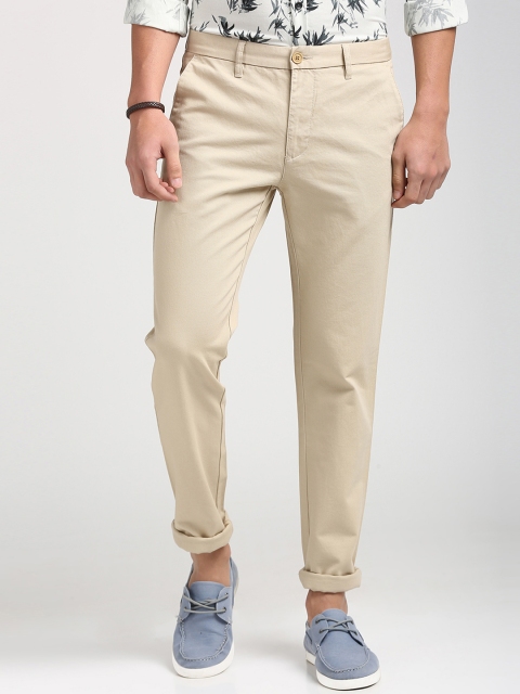 

Peter England Casuals Men Beige Slim Fit Solid Regular Trousers