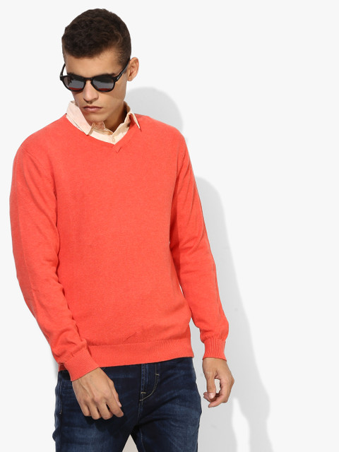 

Peach Solid V Neck Sweater