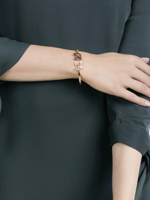 

SWAROVSKI Rose Gold-Plated Facet Swan Bangle