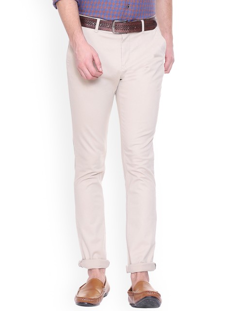 

Van Heusen Sport Men Beige Slim Fit Solid Regular Trousers