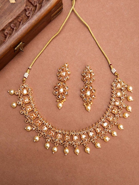

Voylla Women Gold-Toned & Yellow Stone-Studded Jewellery Set