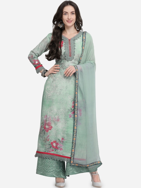 

Rajnandini Turquoise Blue Printed Semi-Stitched Dress Material