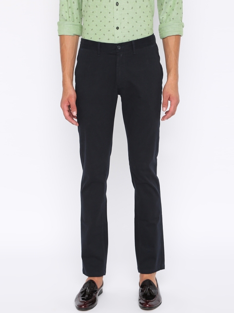 

Basics Men Navy Blue Tapered Fit Solid Regular Trousers