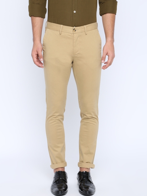 

Basics Men Beige Skinny Fit Self Design Regular Trousers