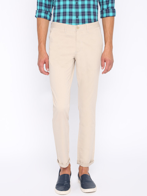 

Basics Men Beige Tapered Fit Solid Regular Trousers