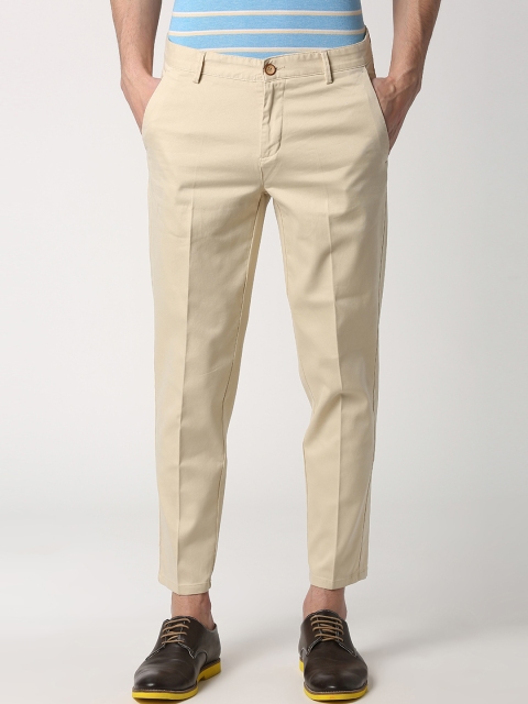 

Peter England Casuals Men Beige Slim Fit Self Design Regular Trousers