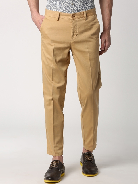 

Peter England Casuals Men Brown Tapered Fit Self Design Regular Trousers