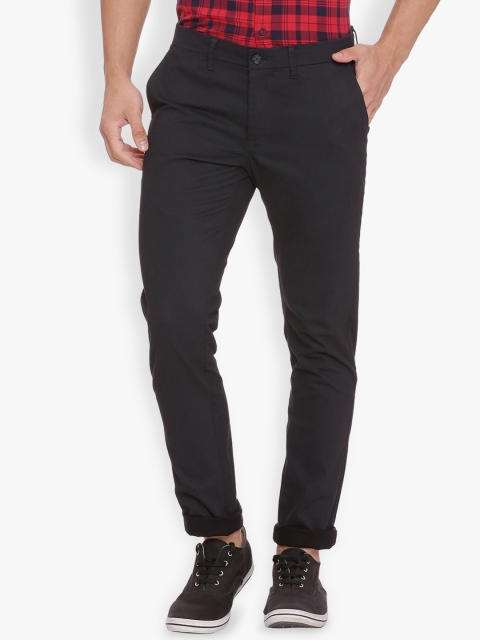

Basics Men Black Tapered Fit Solid Regular Trousers