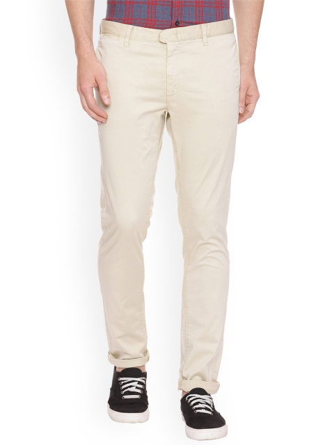 

Basics Men Beige Tapered Fit Solid Regular Trousers