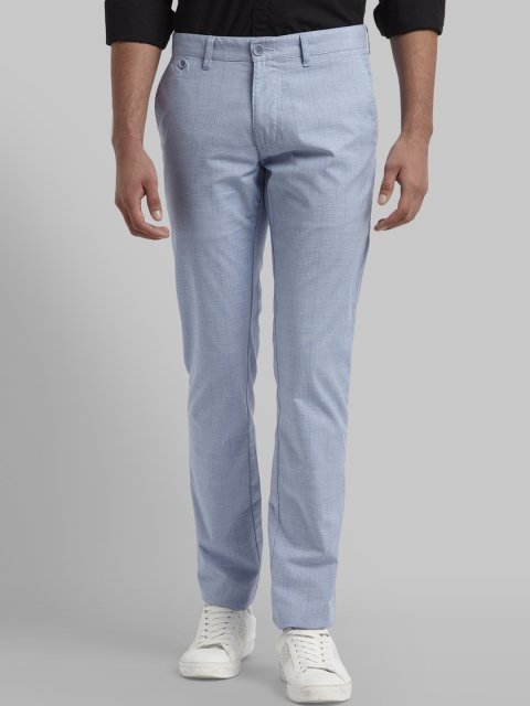 

Parx Men Blue Tapered Fit Self Design Regular Trousers