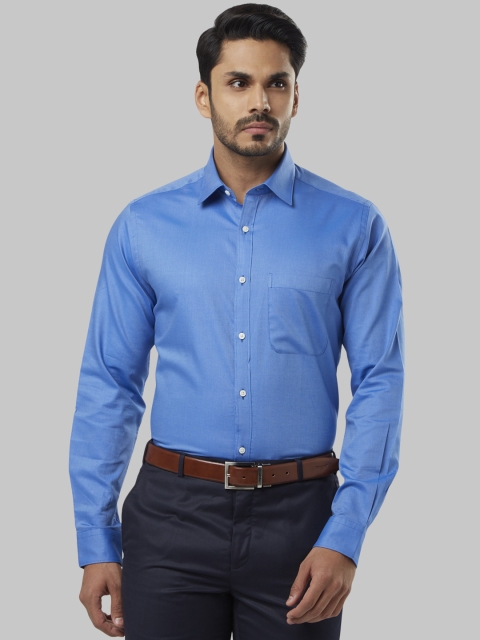 

Raymond Men Blue Slim Fit Solid Formal Shirt