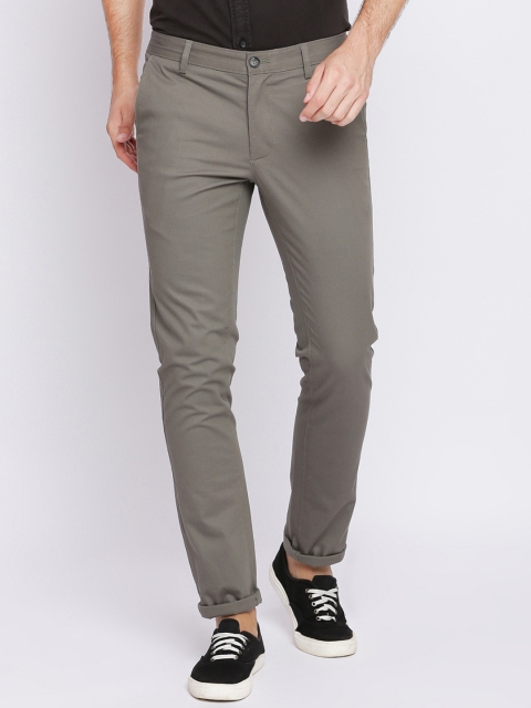 

Basics Men Green Tapered Fit Solid Regular Trousers