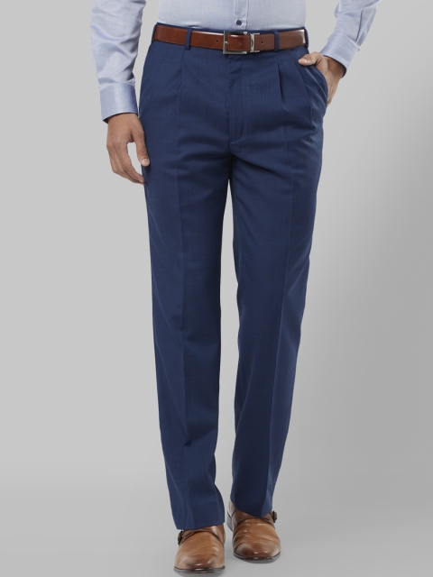 

Raymond Men Blue Regular Fit Self Design Formal Trousers