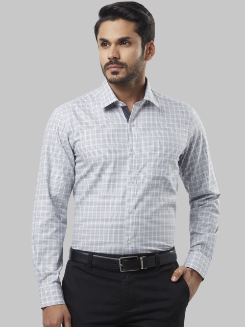 

Raymond Men White & Blue Regular Fit Checked Formal Shirt