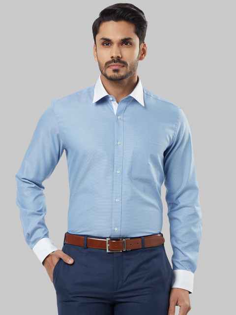 

Raymond Men Blue Regular Fit Solid Formal Shirt
