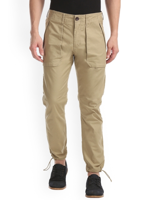 

Cherokee Men Beige Regular Fit Solid Regular Trousers