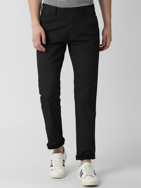 

Peter England Casuals Men Black Slim Fit Self Design Regular Trousers