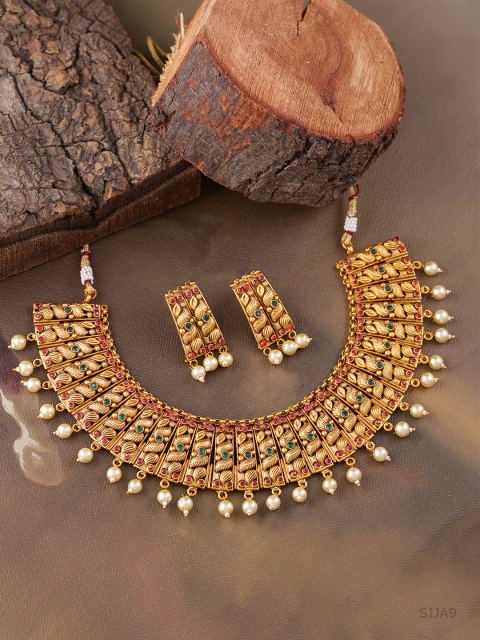 

Voylla Women Gold-Toned & Red Stone Studded Handcrafted Jewellery Set