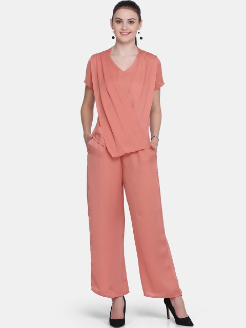 

Eavan Women Peach-Coloured Solid Basic Jumpsuit