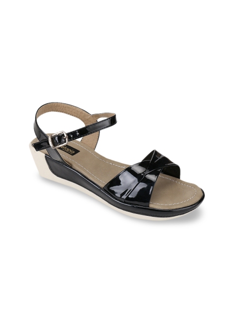 

Shoetopia Women Black Solid Heels