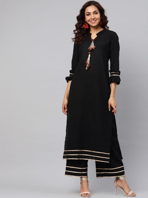 

Idalia Women Black Solid Kurta with Trousers