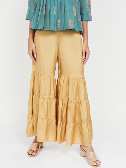 

Melange by Lifestyle Women Gold-Toned Solid Flared Palazzos