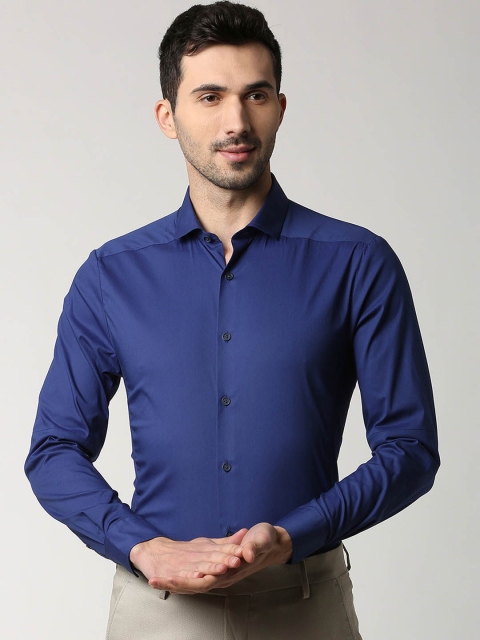 

Peter England Men Blue Slim Fit Solid Formal Shirt