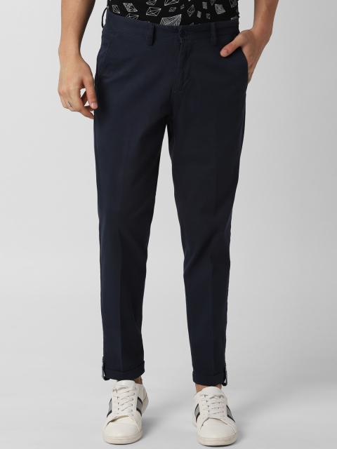 

Peter England Casuals Men Navy Blue Tapered Fit Solid Regular Trousers