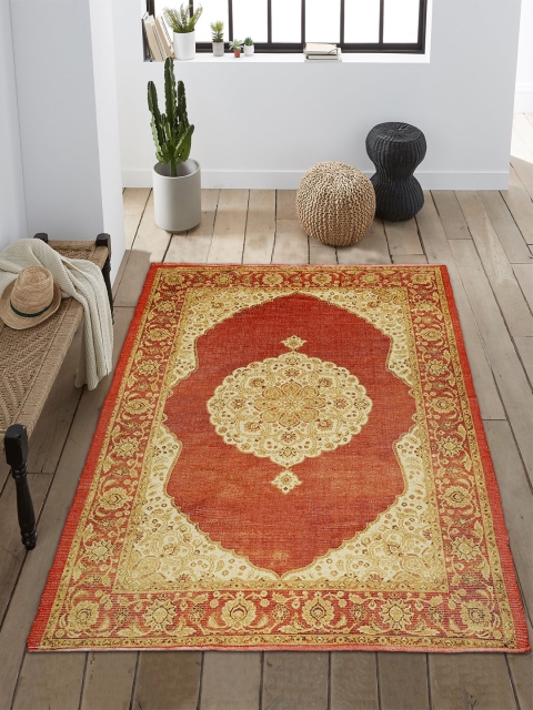 

Saral Home Orange & Beige Printed Carpet