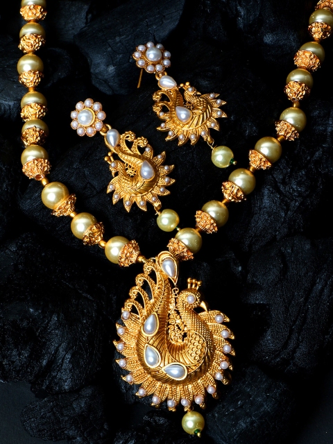 

ANIKAS CREATION Women Gold-Plated & White Pearl Stone-Studded Temple Jewellery Set