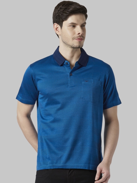 

Park Avenue Men Blue Solid Polo Collar T-shirt