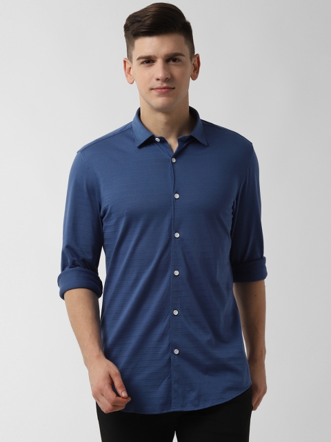 

Peter England Men Blue Slim Fit Self Design Casual Shirt