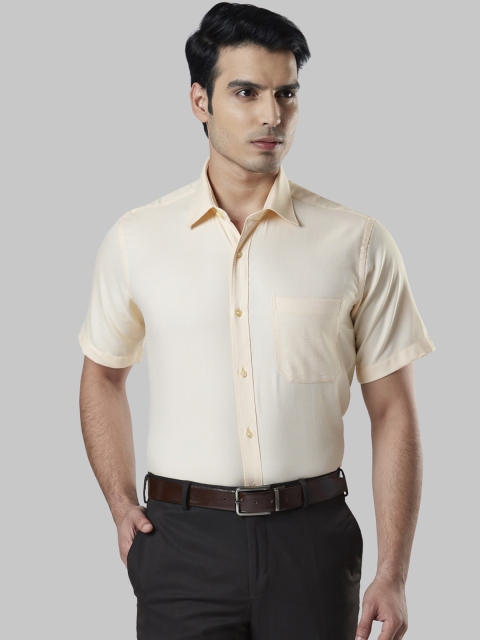 

Raymond Men Beige Regular Fit Solid Formal Shirt