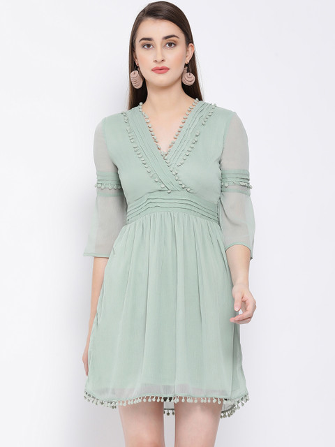 

Oxolloxo Women Solid Green Fit and Flare Dress