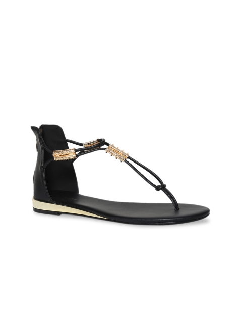 

Stride Women Black Solid T-Strap Flats