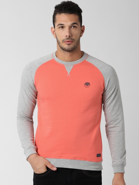 

Peter England Casuals Men Coral Pink & Grey Solid Sweatshirt