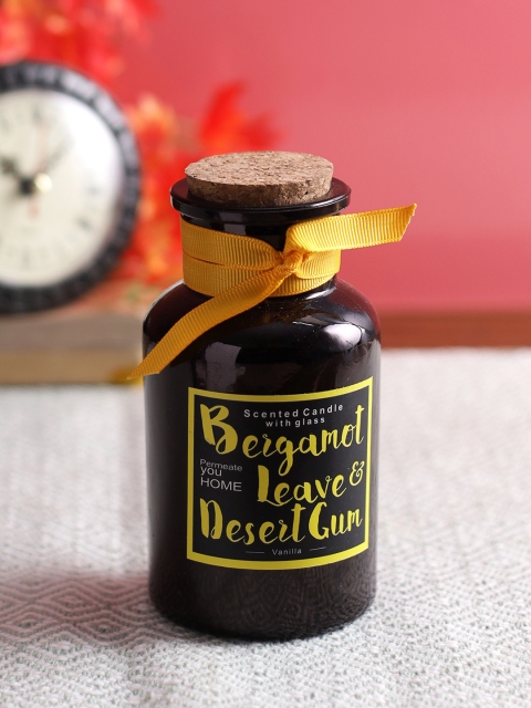 

Aapno Rajasthan Black Bergamot Leaves & Desert Gum Pungent & Refreshing Glass Candle with Stopper
