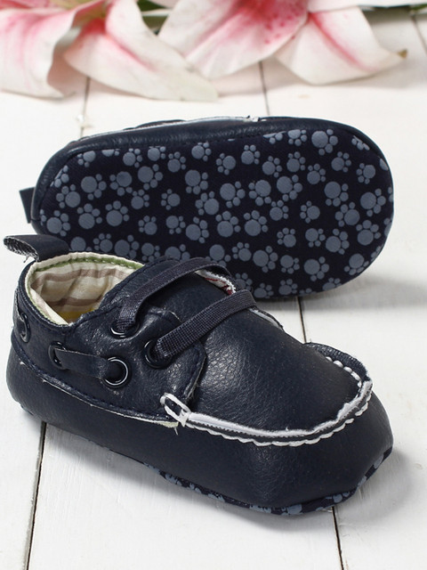 

Walktrendy Infant Boys Navy-Blue Solid Moc-Toe Style Booties