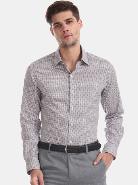 

Arrow Men Beige & Blue Slim Fit Printed Formal Shirt